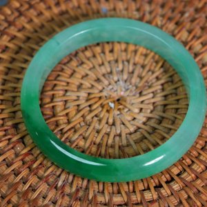 Jadeite bangle, icy green color, 53.3mm in diameter.