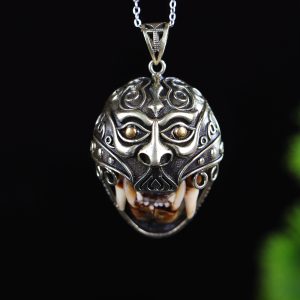 A vintage silver ring with engraved and inlaid ivory carving.