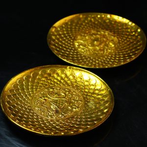 A pair of old collection gilded Four Divine Beasts' Qilong and Xuanwu dish-shaped ornaments.