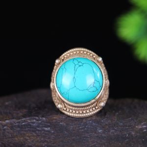 An old collection, a ring with a suspected turquoise cabochon setting.
