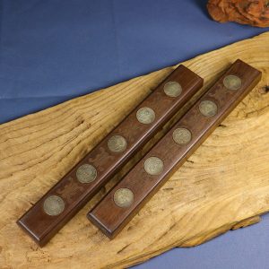 A pair of silver coin inlayed rosewood weight marker. Dimensions approximately: 300*45mm