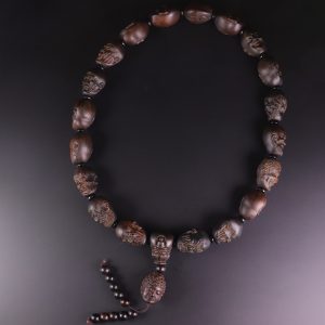 Natural old material black kanchanamari agarwood carving of a Bodhisattva holding a staff There is a certificate.